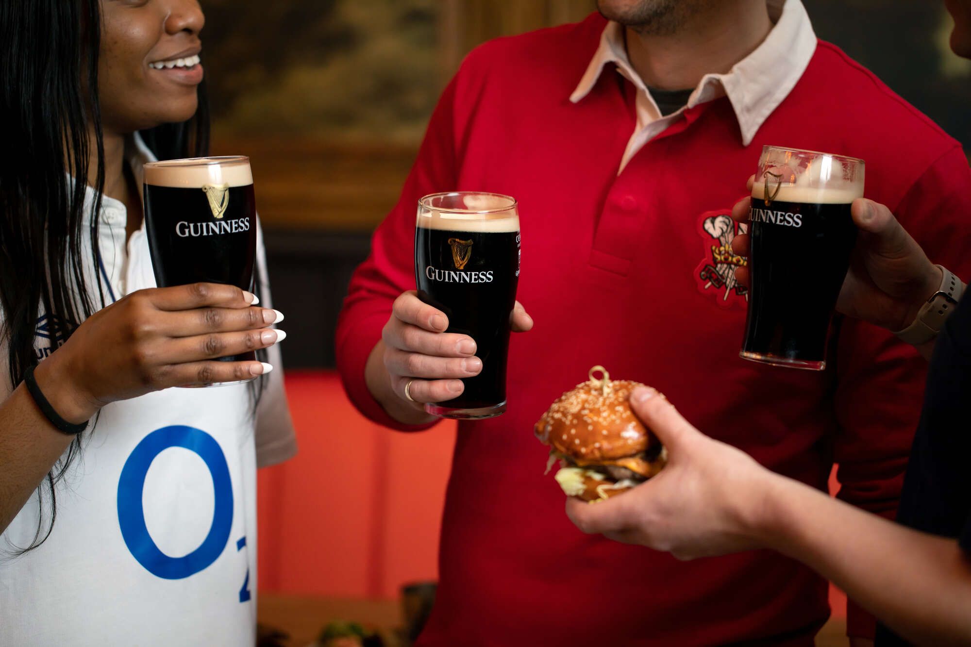 watching Rugby eating burger and drinking Guinness in Newport
